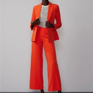 NWT New York & Company Women's Orange fit to flare seams pants size 10 petit